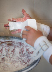 gymnast chalking hands