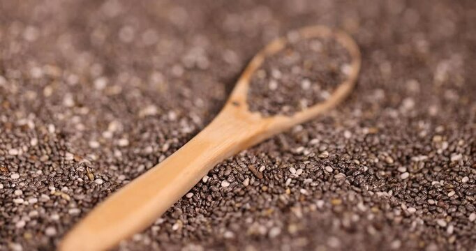 black and white chia seeds for a healthy diet, a large number of chia seeds for adding to yogurts, desserts and other food products