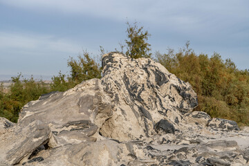 Obsidian Butte on the south shore of the Salton Sea. Calipatria, Imperial County, California. The Salton Buttes lie within the Salton Sea Geothermal Field. Rhyolite. dry lake bed.