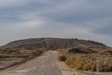 Obsidian Butte on the south shore of the Salton Sea. Calipatria, Imperial County, California. The Salton Buttes lie within the Salton Sea Geothermal Field. Rhyolite. dry lake bed.