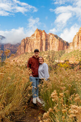 Fototapeta premium Couple enjoys a serene moment in Zion National Park's stunning landscape