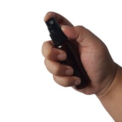 hand holding a plastic bottle spray isolated on a white background