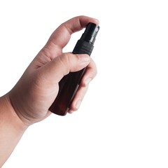 hand holding a plastic bottle spray isolated on a white background