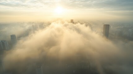 Fototapeta premium Sunrise over urban skyline aerial view foggy environment nature and architecture tranquil cityscape
