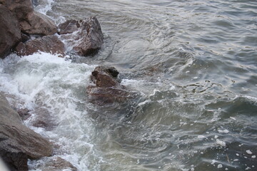 Naklejka premium Image of waves crashing on Imrang Beach in Busan, Korea 