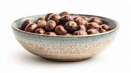 Fototapeta premium Roasted chestnuts in a porcelain bowl for snacking on a white background. 
