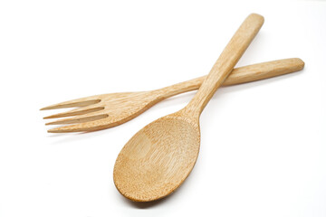 Wooden spoon and wooden fork isolated on white background