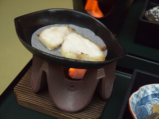 Heating Gindara Black cod steak on personal frying pan for japanese breakfast 
