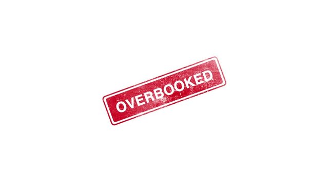 Wood rubber stamp with overbooked word text and red ink
