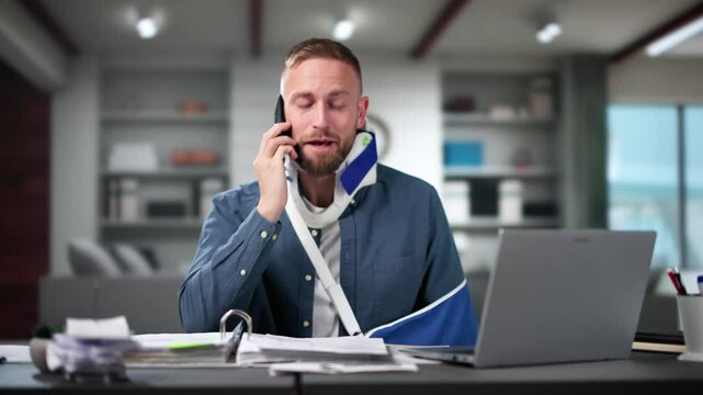 Injured Man Talking On Phone