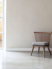 Minimalist chair placed in a modern room with natural light streaming through a window