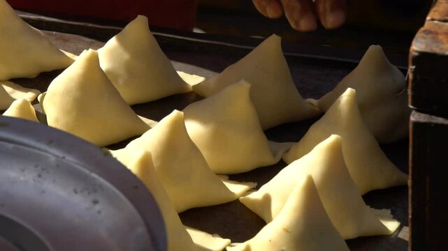 Making Somosas, street food in the halls of Rishikesh India,