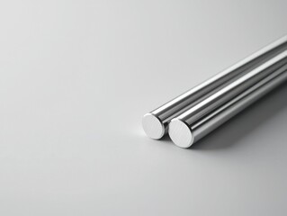 Sleek stainless steel rods on smooth white surface minimalist design showcase studio photography contemporary aesthetic close-up view industrial elegance