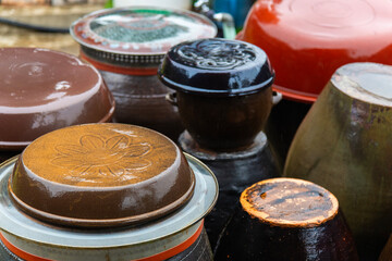 ceramic jars, a traditional Korean food container called Jangdok, in the rain