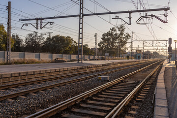 Train track with a few people walking on it