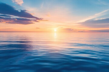 Fototapeta premium Serene ocean view at sunset, showcasing calm waters and vibrant sky.