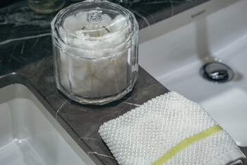 Super deluxe black and white marble bathroom of suite stateroom cabin onboard luxury ocean liner...