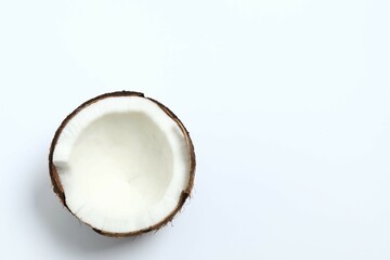 Coconut on white background, top view
