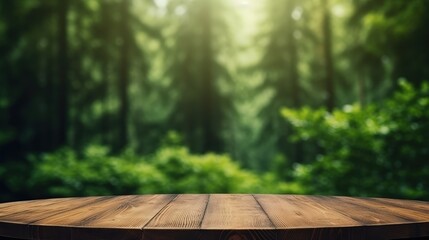 Empty wood table top   on green forest background,  for display or montage your products.
