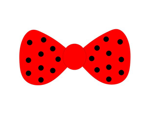 red bow with black polka dots on a white background