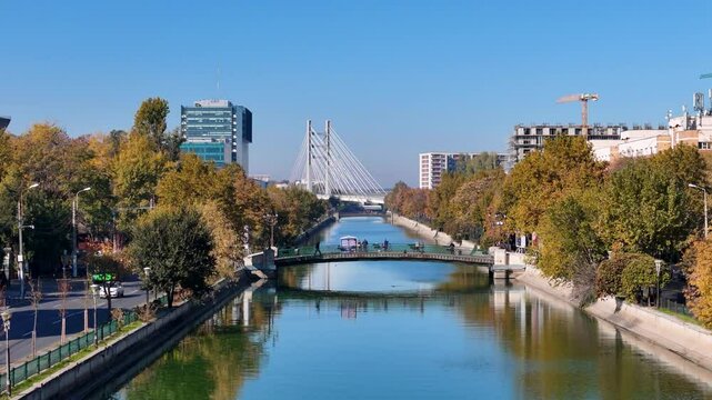 Gliding Above Dambovita River in Regie Neighborhood, Ciurel Bridge, Autumn, Bucharest, Romania