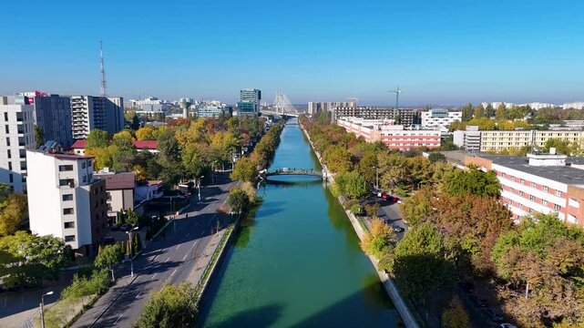 Soaring Above Dambovita River in Regie Neighborhood with Ciurel Bridge in View, Autumn, Bucharest, Romania