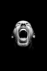 Obraz premium A man expressing raw emotions through a powerful yell in a dark, minimalistic environment showcasing vulnerability and intensity