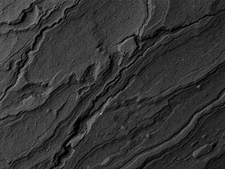 Naklejka premium Close up of dark stone texture background