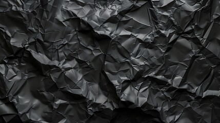 Black paper texture. Dark black wrinkled paper texture