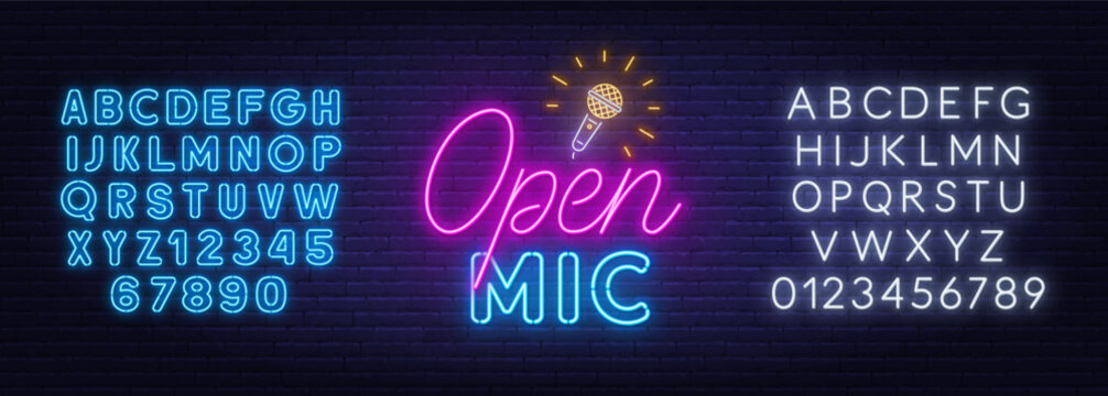 Open Mic Neon Sign on brick wall background. Light logo for a standup show