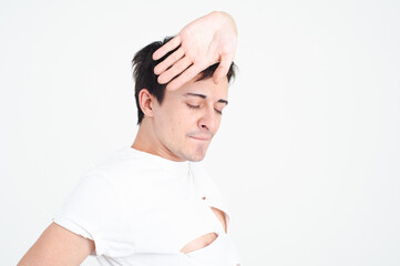 Young attractive man dancing in the studio.