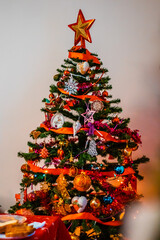 Vertical shot of decorated colourful Christmas tree in Romania