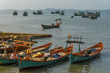 Obraz premium Crab fishing boat resting on the shore in Ket, Cambodia