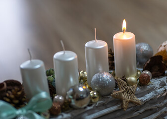 The symbol of Advent is an Advent wreath with four candles. The first lit candle on the Advent wreath means HOPE.