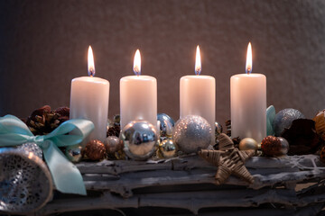 The symbol of Advent is an Advent wreath with four candles. The fourth Advent candle carries the message of Love