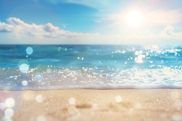 Closeup of sandy beach and sea with bokeh light effect