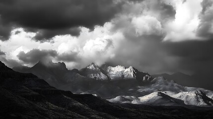 Obraz premium Dramatic Monochrome Mountainscape Under a Stormy Sky