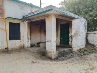 wood oven Kitchen of sarkari school in village, clay stove and dirty kitchen of Indian government primary school. smoke over the stove door, danger, neglect. 20 December 2022, Varanasi, India.