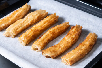 Spanish Churros. Traditional spanish food in the oven