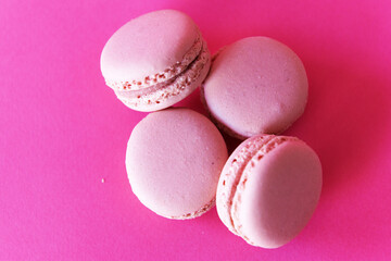 pink macarons on a pink background