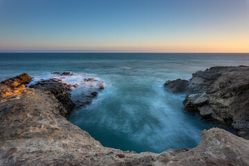 Sunset over the tranquil waters of Malibu coast