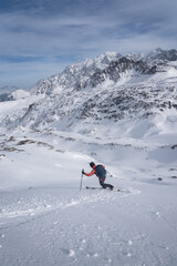 skiing in the mountains with Mont Blanc in the background