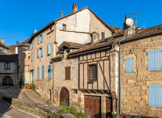 Facades of typical houses in Caylus, in Tarn et Garonne, Occitanie, France