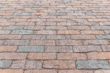 abstract background of brick tiled road in the park perspective view shallow depth of field
