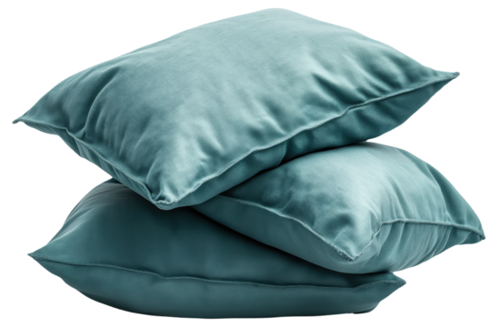 Three stacked teal pillows with a silky texture