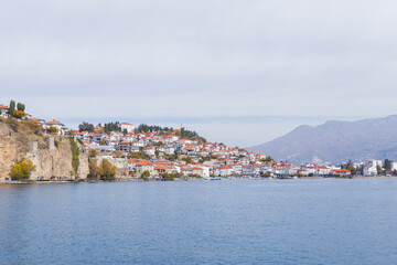 Fototapeta premium Panoramic View of Ohrid Lake and Town Under a Stunning Blue Sky