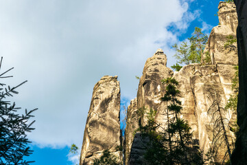 Majestic sandstone cliffs surrounded by lush greenery and forests for tourism, ecotourism