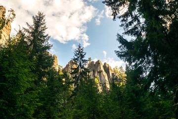 Majestic sandstone cliffs surrounded by lush greenery and forests for tourism, ecotourism