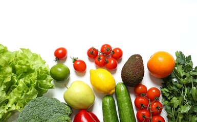 Clean healthy eating habits concept. Fruits, herbs, greens and vegetables mix, colorful juicy organic detox smoothie juice ingredients, white background. Vegan vegetarian diet food