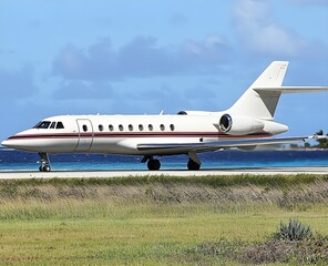 Obraz premium A private jet sits on the runway poised for takeoff sleek and modern against the backdrop of a clear sky